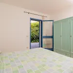 Isa-residence With Swimming-pool In Cala Girgolu, With Private Outdoor Area Aparthotel