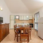 Aparthotel Isa-residence With Swimming-pool In Cala Girgolu, With Private Outdoor Area